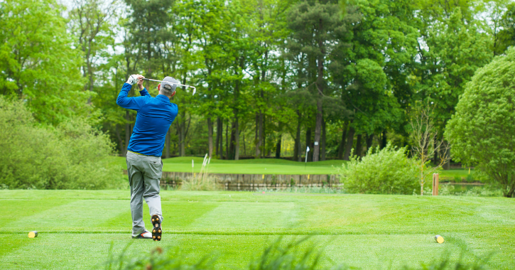 man playing golf at Headlam Hall Hotel golf course.